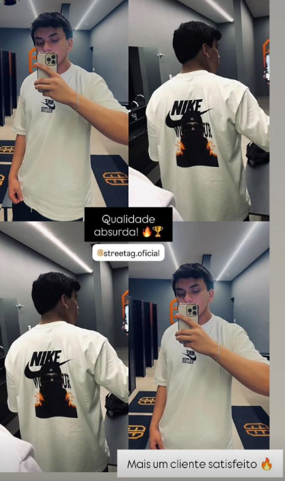 Cliente com camiseta oversized Nike da StreetTag no provador
